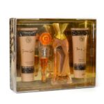 FRENCH CANCAN 4 PCS. GIFT SET: 3.3 FL.OZ. EDP SPRAY 4.3 FL.OZ. SHOWER GEL 4.3 FL.OZ. BODY LOTION AND .6 FL.OZ. EDP SPRAY FOR WOMEN