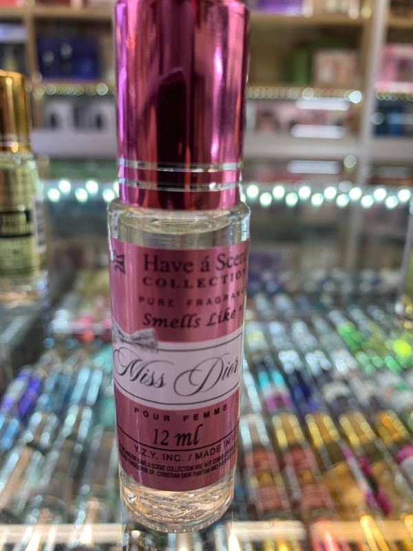 OMD12OWb.jpg MISS DIOR 0.35 Fl. Oz. Rolletique- Oil Roll-on Women - Image 1