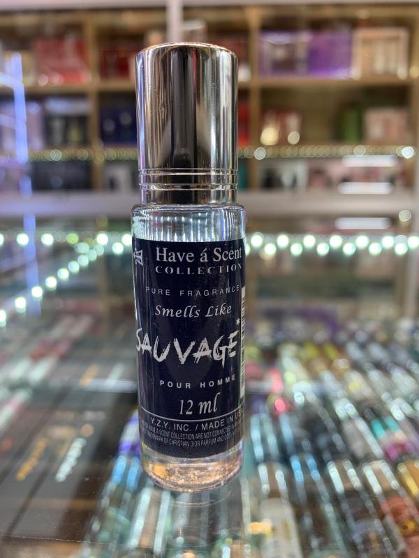 Ods12OM.jpg ROLLETIQUE- SAUVAGE by dior 0.35 OZ. Rolletique- Oil Roll-on - Image 1
