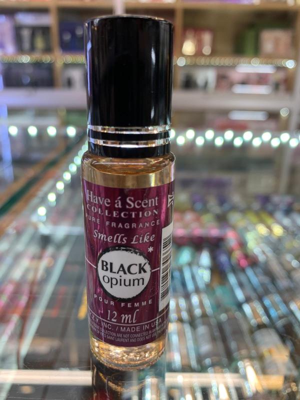 Oopi12OWb.jpg BLACK OPIUM 0.35 Fl. Oz. Rolletique- Oil Roll-on Women - Image 1
