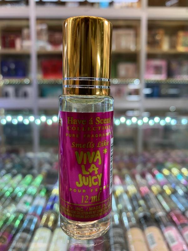 ojcouvw.jpg VIVA LA JUICY 0.35 Fl. Oz. Rolletique- Oil Roll-on Women - Image 1